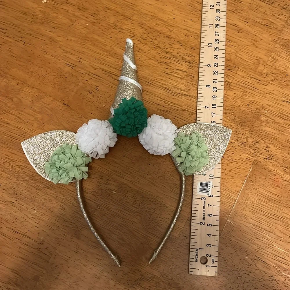Gold Glitter Unicorn Headband With Green and White Pom Poms